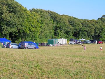 Toilet and shower blocks in the distance