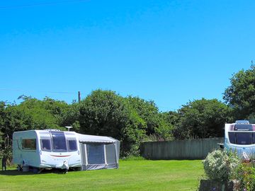 Well-spaced serviced pitches within easy reach of site showers
