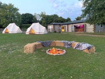 Firepit and straw-bales seating