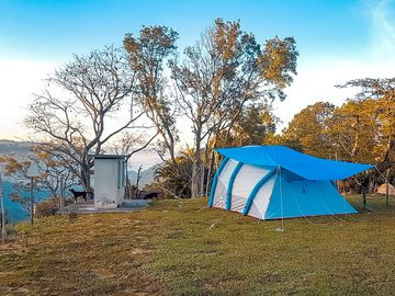 Pitch by the trees for shade