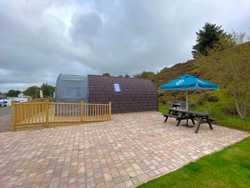 Ramp and outdoor dining area of the universally accessible glamping pod