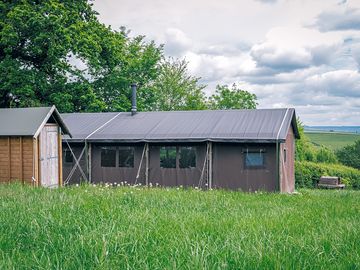 Canvas hideaway with private outdoor shower
