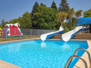 Swimming pool with waterslides