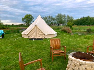Seating outside the bell tent