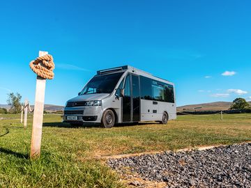 Campervan hardstanding grass pitch without electric