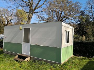 Green summer caravan