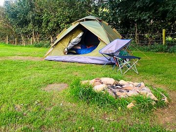 Hedgeside pitch in car-free family camping area