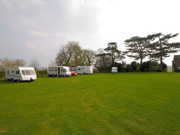 Pitches on a tree-lined field