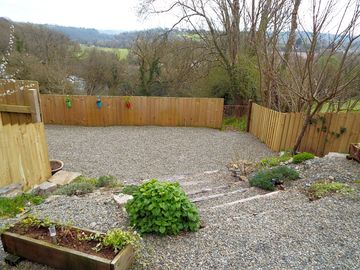 Garden secured with gated fence