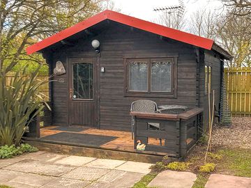 Exterior of the log cabin