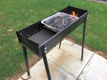 The glamping pod has a bbq station and one disposable bbq provided