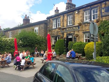 Have a pint at the woolpack inn