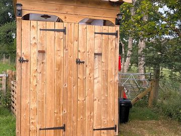 Toilet and shower unit