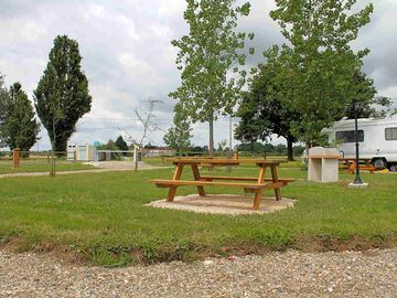Grass pitch with picnic table