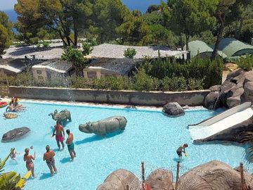 Swimming pool with waterslides for children