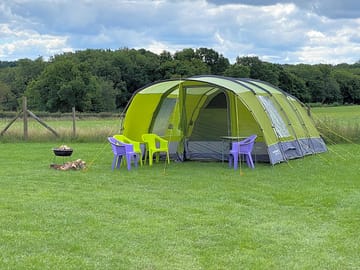 Pre-pitched tent with fire pit hire