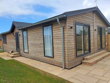 Side view of lodge and patio
