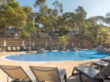 Relax by the outdoor swimming pool