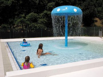 Swimming pool with water play area