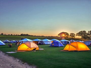 Campsite at sunset with tents