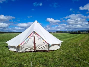 Bell tent pitch with far-reaching views