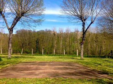 Large concrete base and plenty of grass space around for awnings or gazebos