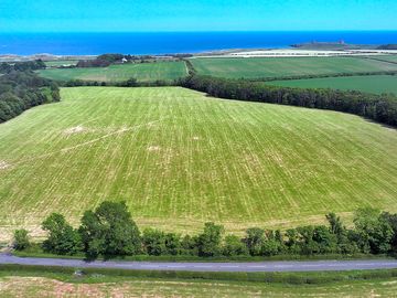 Camping field with the sea beyond