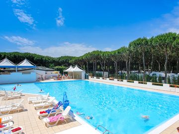 Relaxing by the swimming pool