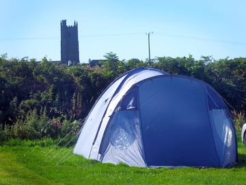 Church field with st buryan village in the background