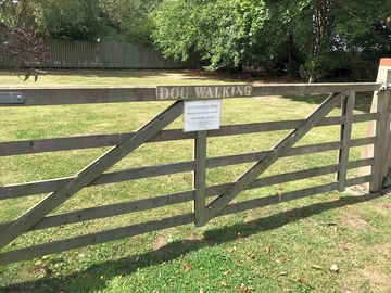 Our enclosed dog exercise paddock with outdoor seating & bbq in the summer
