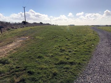 Footpath leading around the site