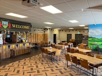 Clubhouse with pool table, dartboard and food