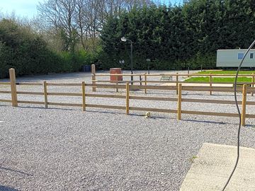 Hardstanding pitch with grass