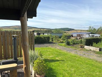 View west over the garden and hills, great place to watch the sun go down