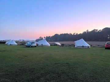 Bell tents at sunset