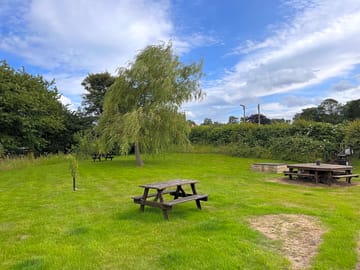 Grassy pitches and picnic tables (added by manager 11 Jul 2023)