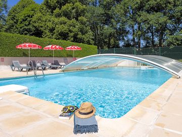 Part-covered swimming pool