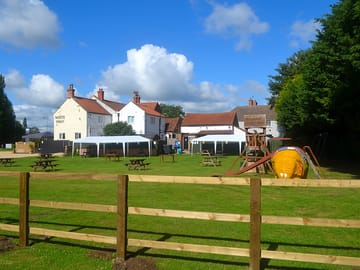 View of the pub from the site (added by manager 04 Aug 2022)