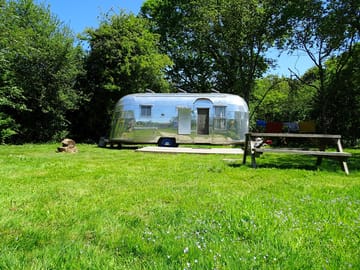 The Airstream Caravanner with decking, a picnic bench and oodles of green space (added by manager 03 Jun 2019)