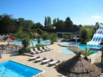 Sun deck by the swimming pool and paddling pool