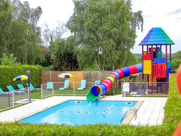 Outdoor swimming pool open in July and August