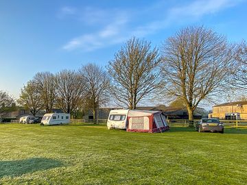 Caravan pitches at sunrise