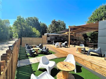 Outdoor seating at la guinguette restaurant