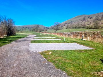 Hardstanding pitches with grass