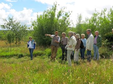 Book orchard tours with cider tasting