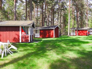 Cabins backed by trees
