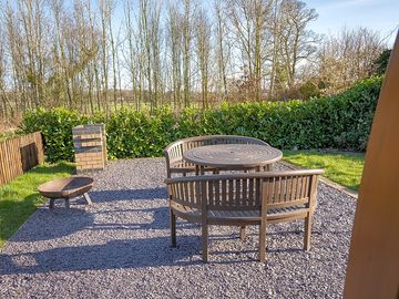 Private garden with firepit, seating and barbecue