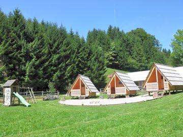 Cabin Lara, Erazem and Vita with children playground.