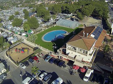 Aerial view of the swimming pools, the restaurant and the playground