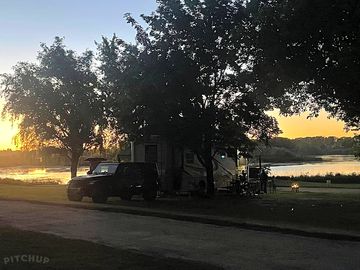 Pull - Through RV Sites. Extra large sites for all your RV needs. "No Rig Too Big!"